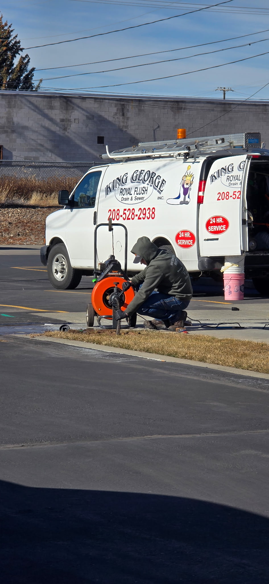 Man Snaking Sewer Line
